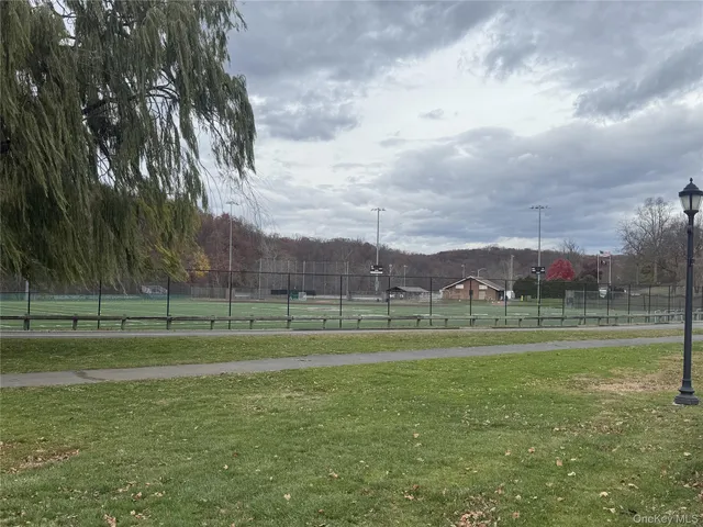 a view of a golf course with a lake