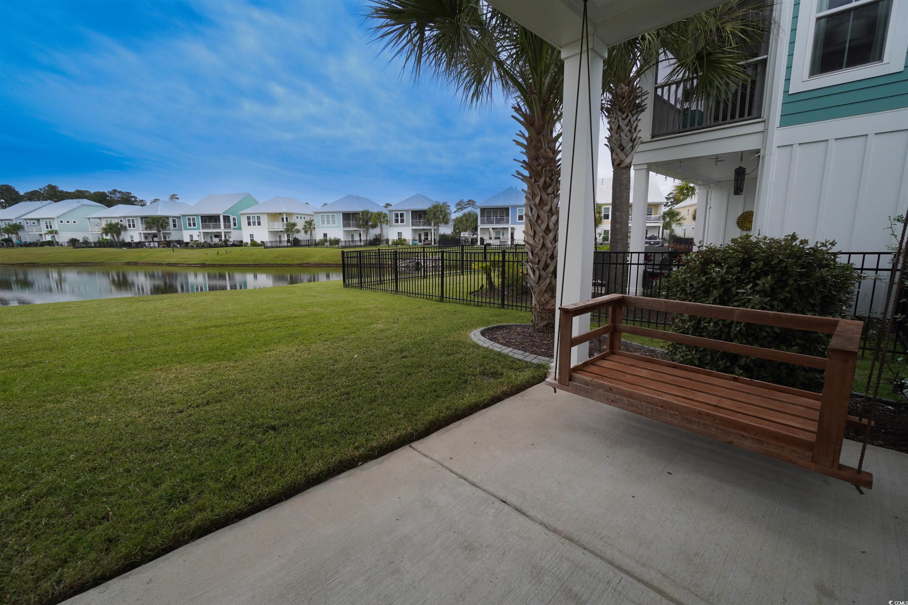 100 Splendor Circle Murrells Inlet, SC 29576 - Photo 31 of 40 View of yard featuring a water view and a patio