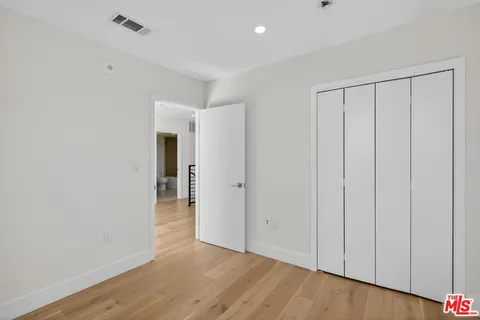 a view of a livingroom with wooden floor