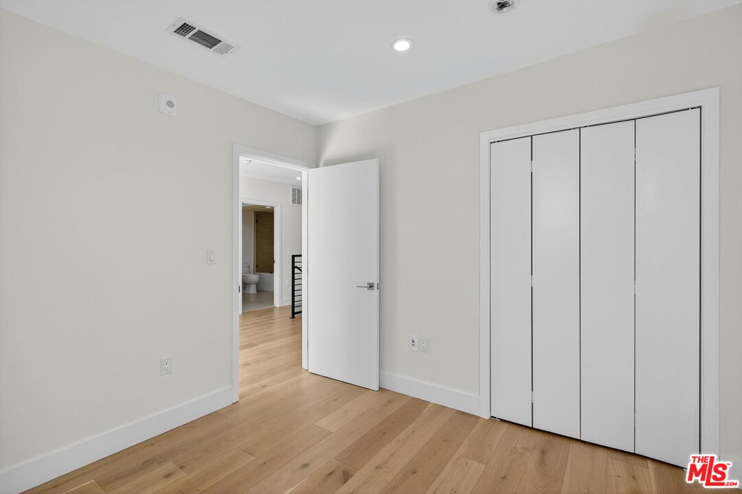 2412 Eads Street, Unit 7 Los Angeles, CA 90031 - Photo 24 of 29 a view of a livingroom with wooden floor