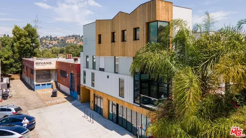 a view of a house with many windows