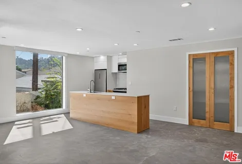 a view of kitchen and front door