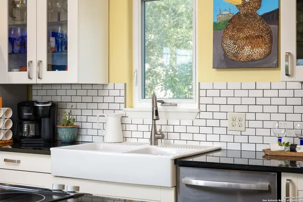 a bathroom with a sink and a bathtub