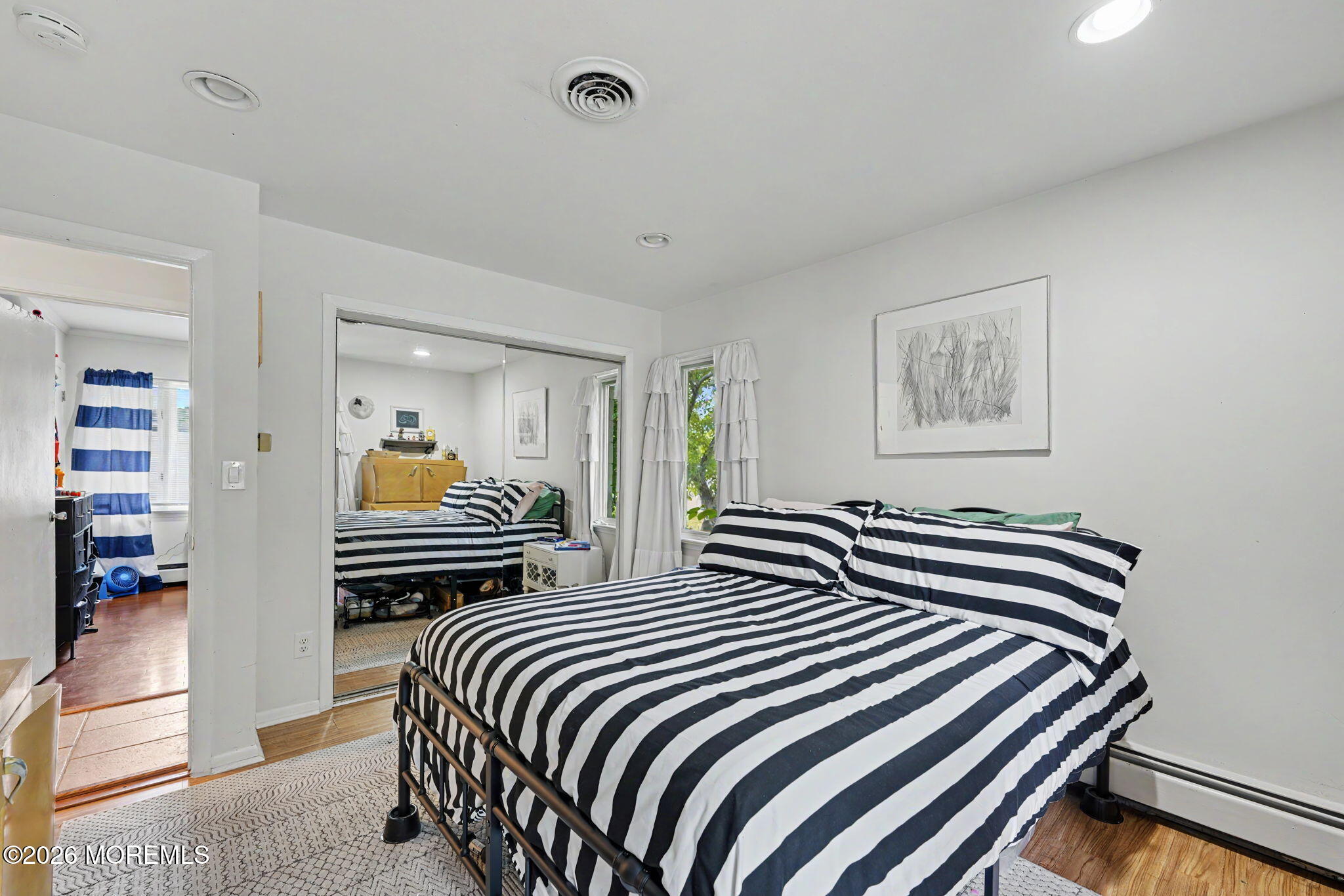 699 Aldrich Road Howell, NJ 07731 - Photo 20 of 30 a bedroom with double bed and a closet