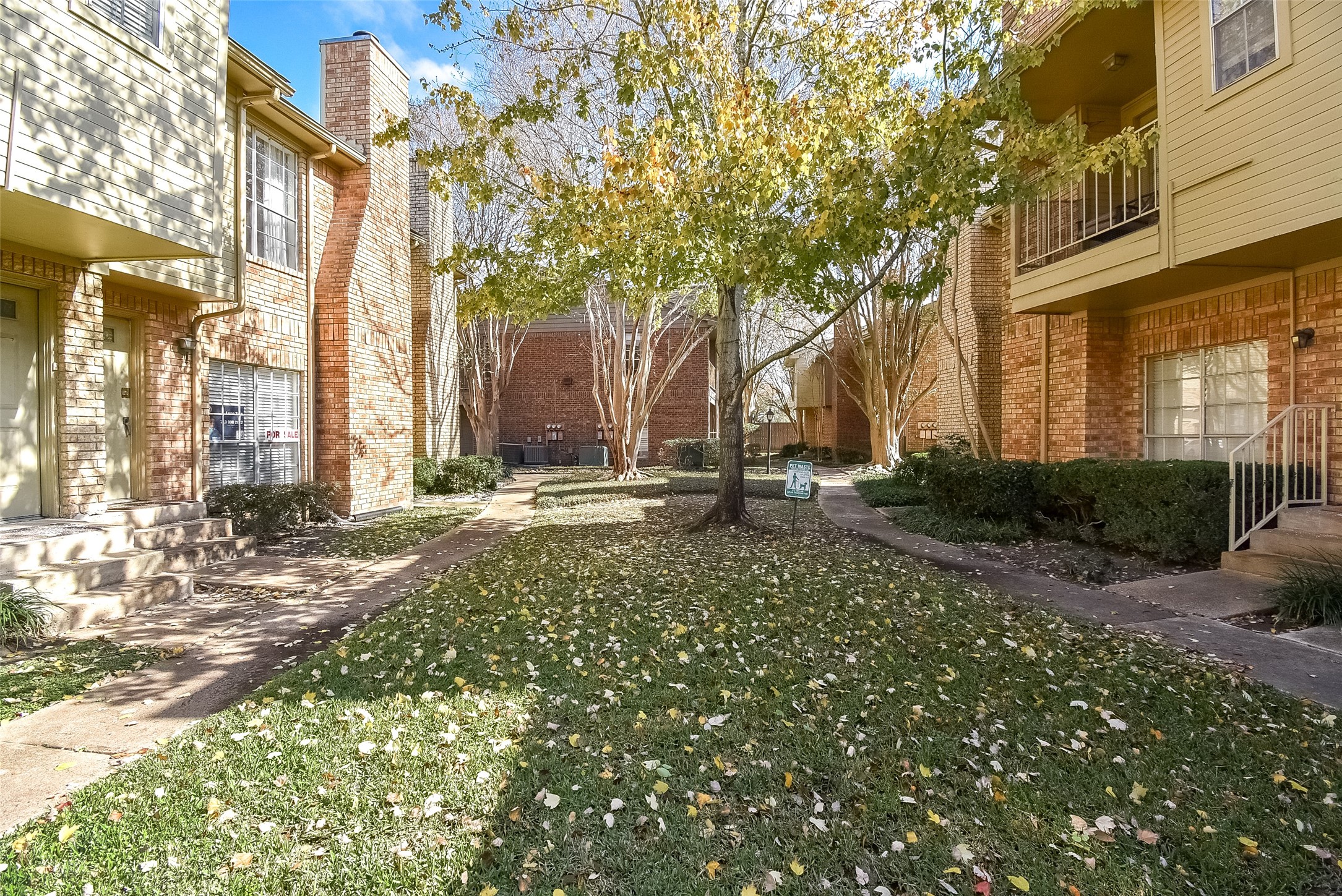 1515 Sandy Springs Road, Unit 1006 Houston, TX 77042 - Photo 23 of 35 a view of a building with pathway