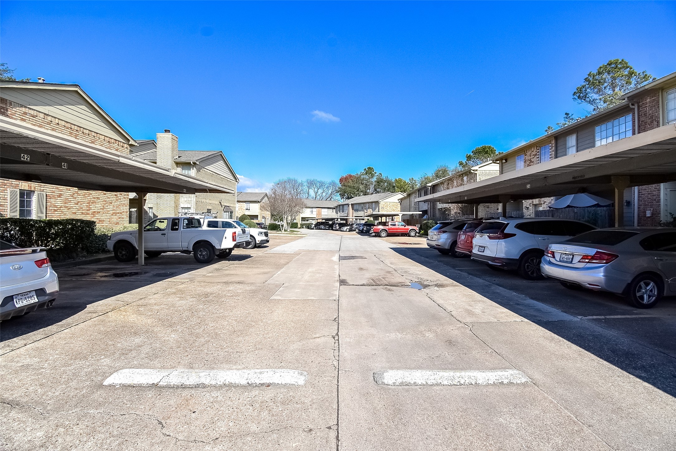 1515 Sandy Springs Road, Unit 1006 Houston, TX 77042 - Photo 25 of 35 a view of street with cars