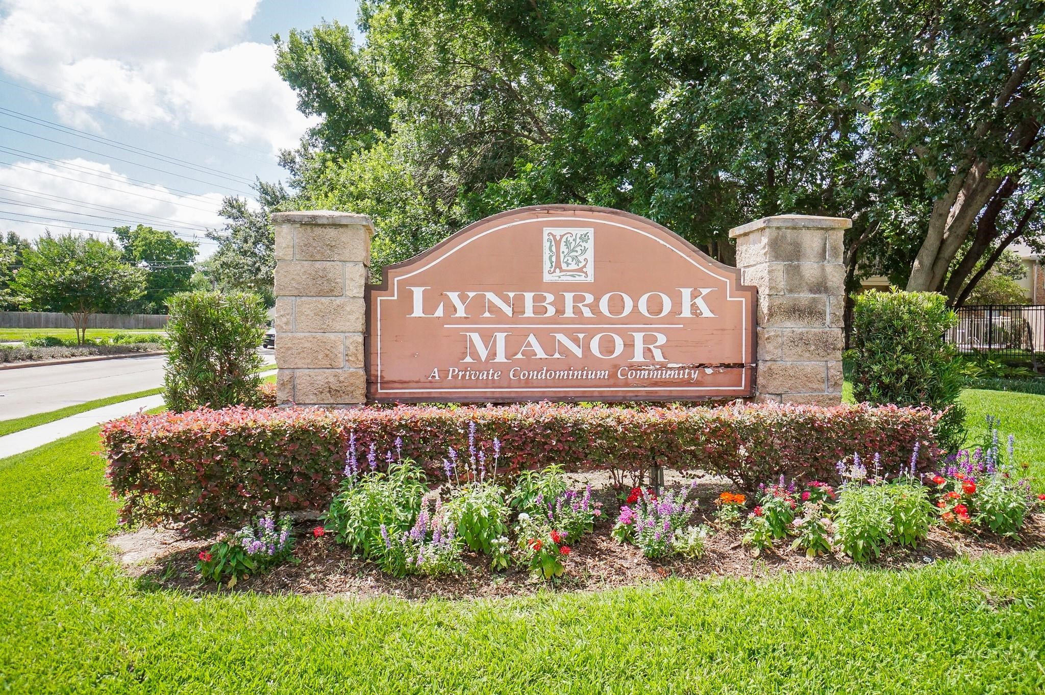 1515 Sandy Springs Road, Unit 1006 Houston, TX 77042 - Photo 26 of 35 a sign that is on the side of the road