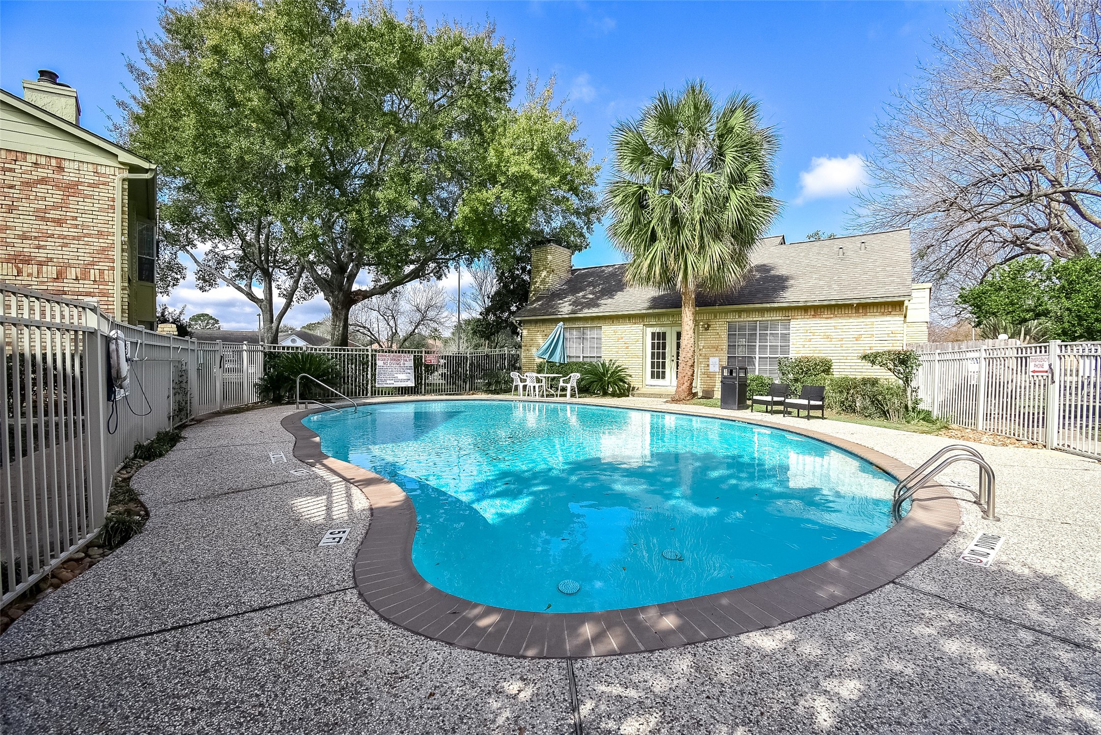 1515 Sandy Springs Road, Unit 1006 Houston, TX 77042 - Photo 29 of 35 a view of a swimming pool with an outdoor space
