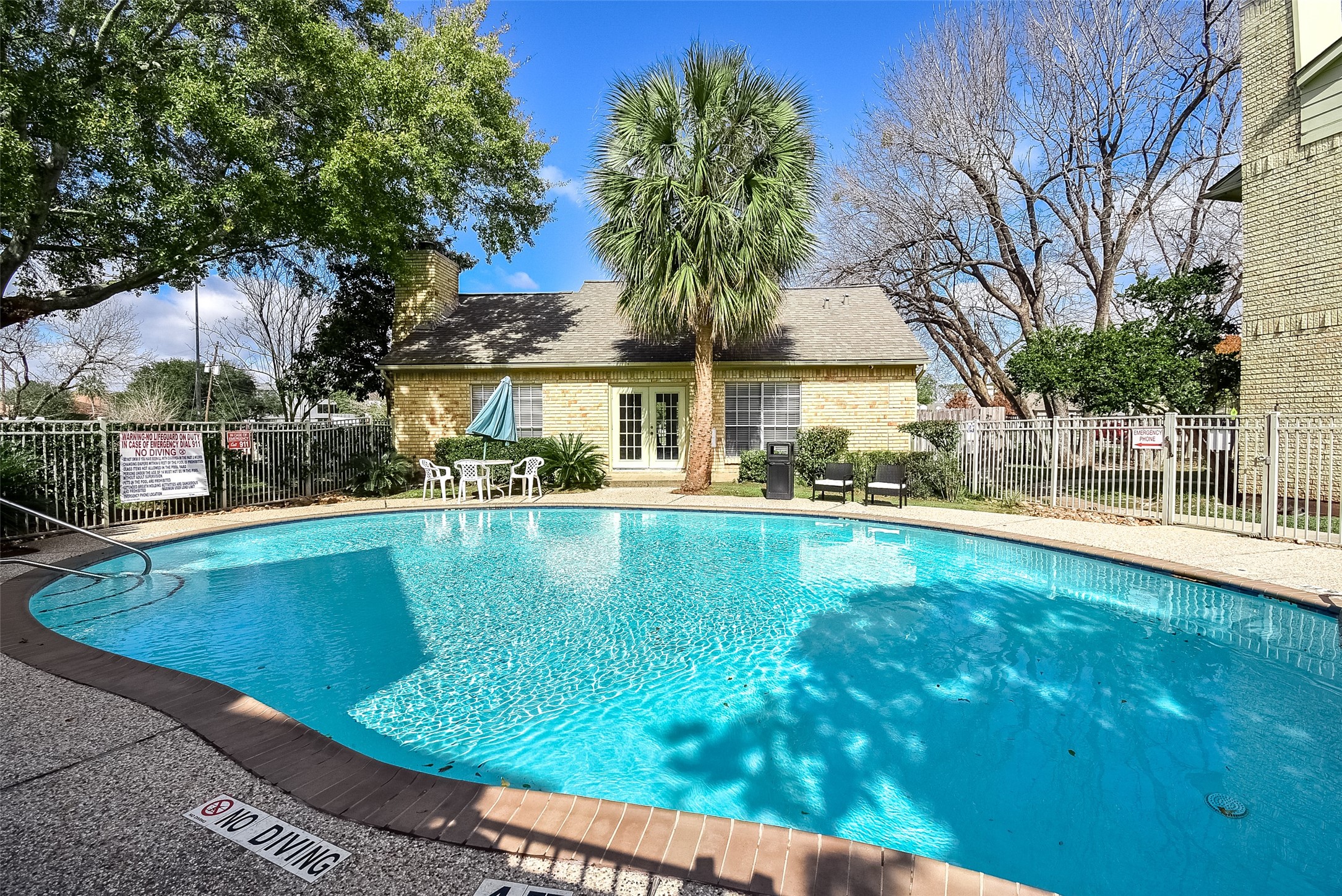 1515 Sandy Springs Road, Unit 1006 Houston, TX 77042 - Photo 33 of 35 a view of a swimming pool with a patio