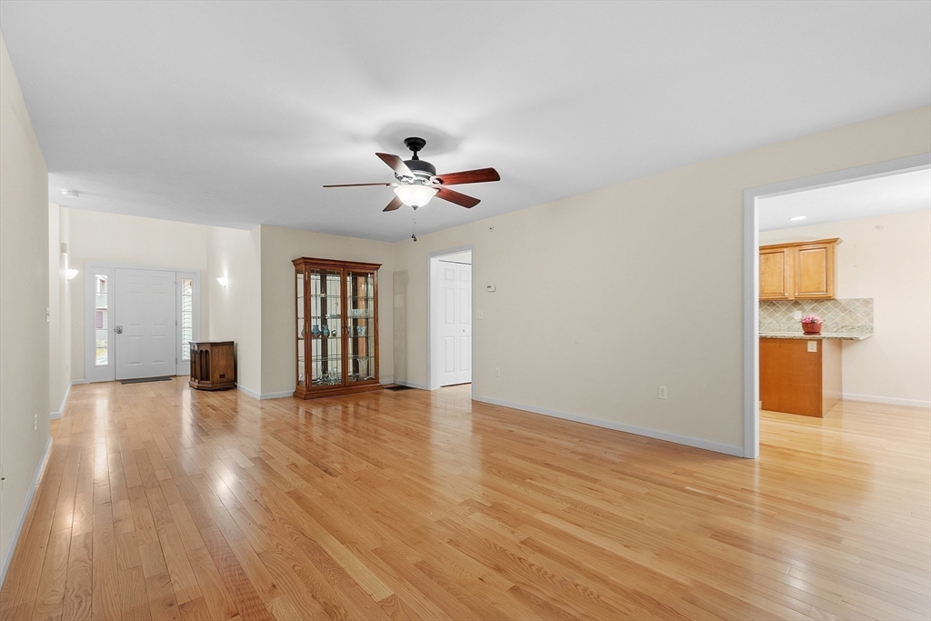 2 Riley Road, Unit C Lunenburg, MA 01462 - Photo 14 of 42 wooden floor in an empty room with a window