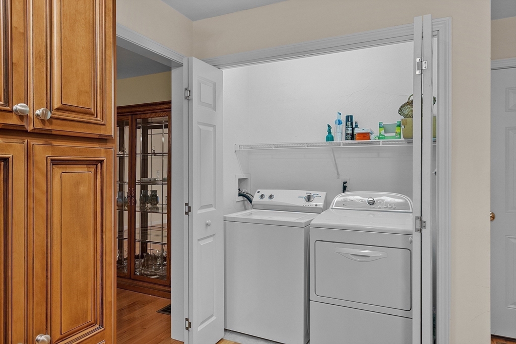 2 Riley Road, Unit C Lunenburg, MA 01462 - Photo 25 of 42 a view of storage and utility room with washer and dryer