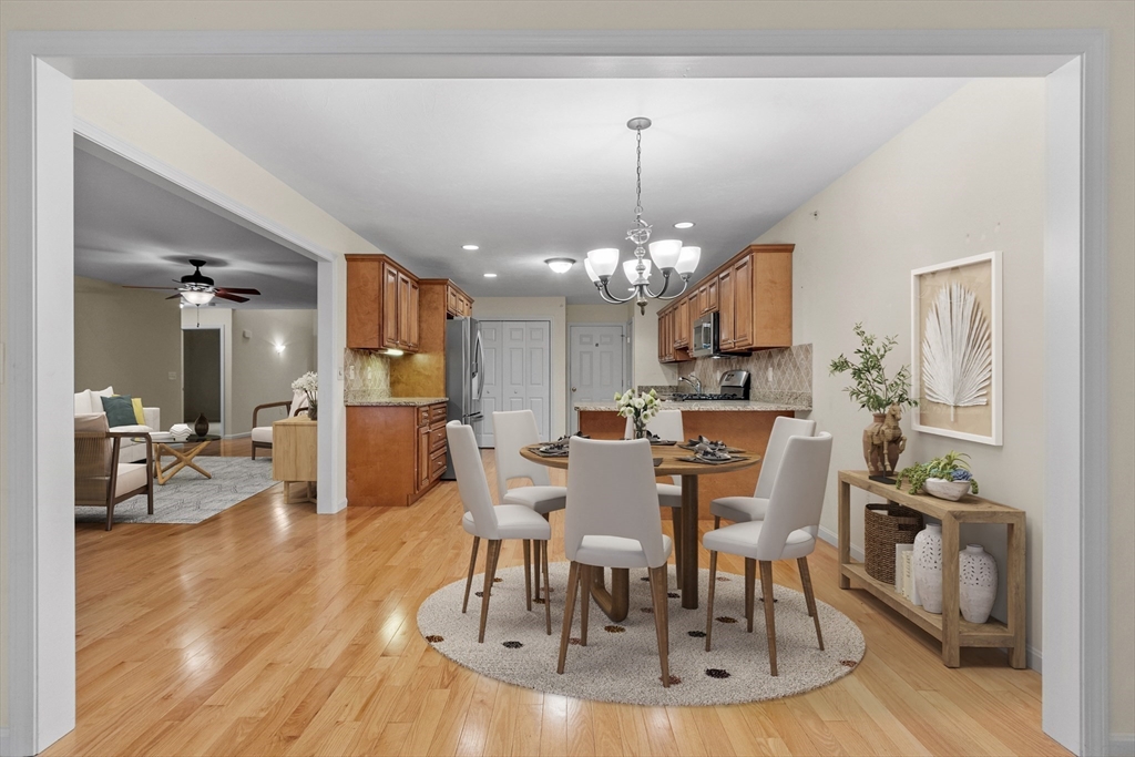 2 Riley Road, Unit C Lunenburg, MA 01462 - Photo 3 of 42 a view of a dining room with furniture and wooden floor