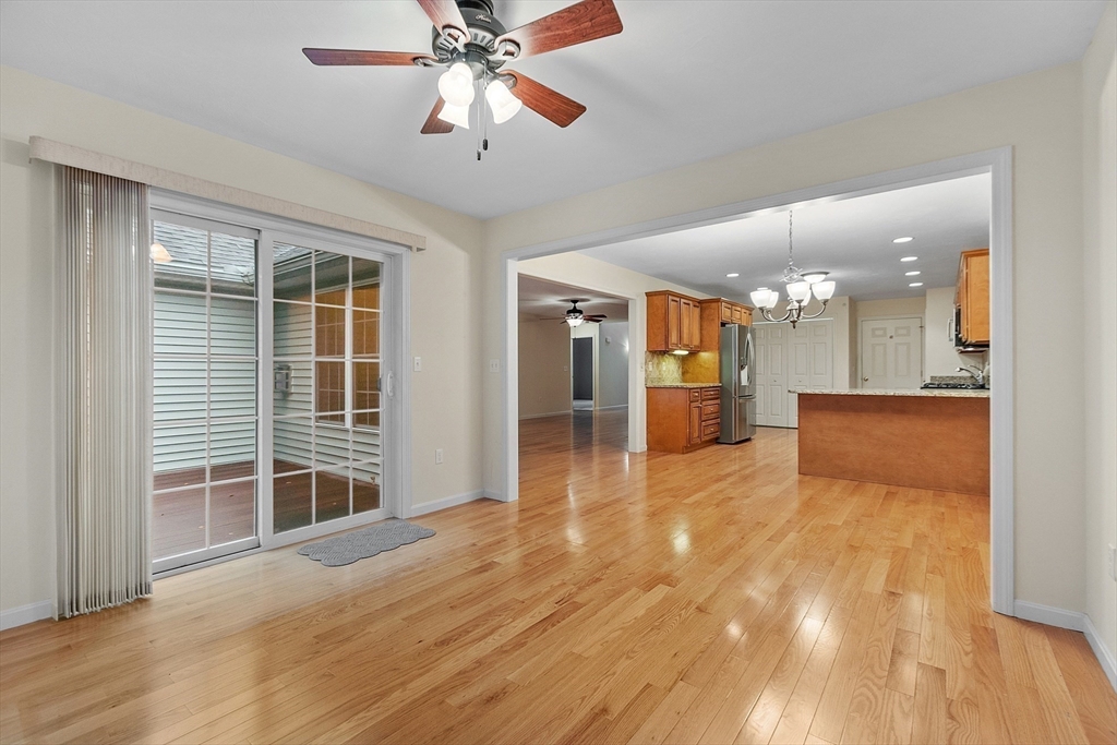 2 Riley Road, Unit C Lunenburg, MA 01462 - Photo 31 of 42 a view of an empty room with wooden floor and a window