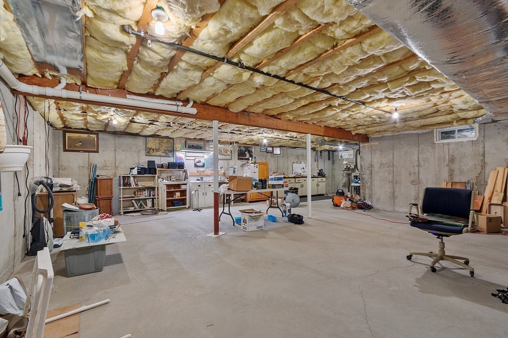 2 Riley Road, Unit C Lunenburg, MA 01462 - Photo 33 of 42 a view of a patio with table and chairs