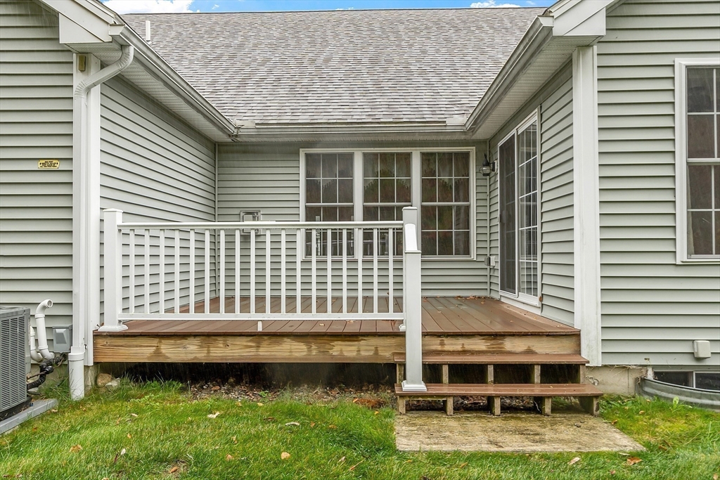 2 Riley Road, Unit C Lunenburg, MA 01462 - Photo 37 of 42 a front view of a house with a yard
