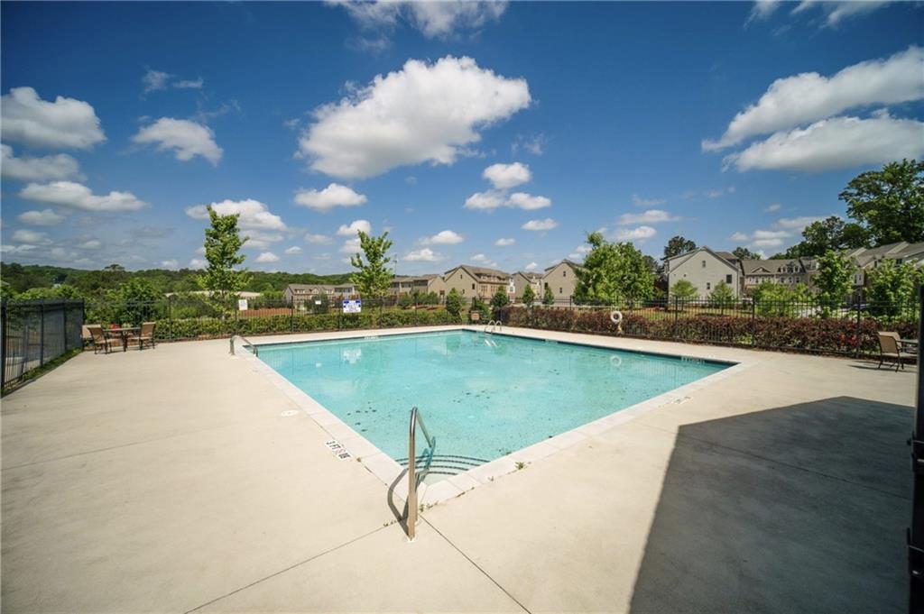 1595 Ridgebrook Downs Mableton, GA 30126 - Photo 37 of 39 a view of a swimming pool and an outdoor space