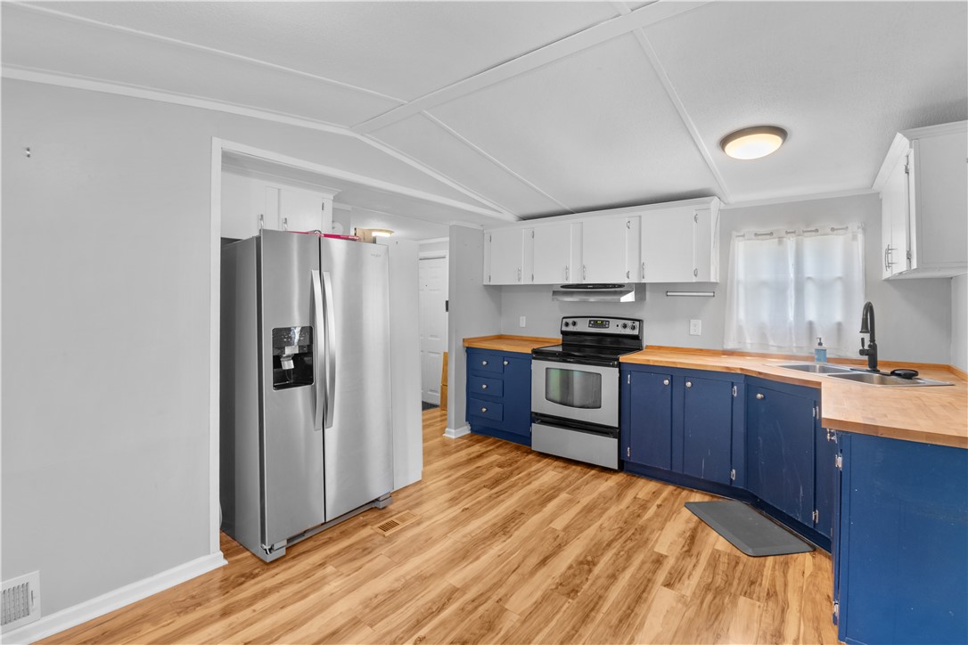 169 West Bagwell Road Liberty, SC 29657 - Photo 13 of 29 A streamlined kitchen layout offers essential appliances and ample counter space for daily living.