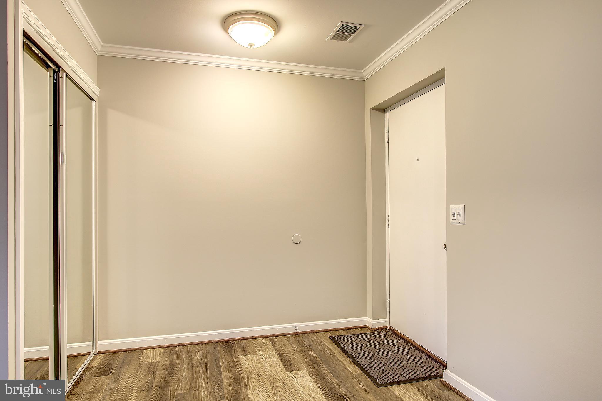 18324 Streamside Drive, Unit 302 Gaithersburg, MD 20879 - Photo 6 of 31 Foyer with closet