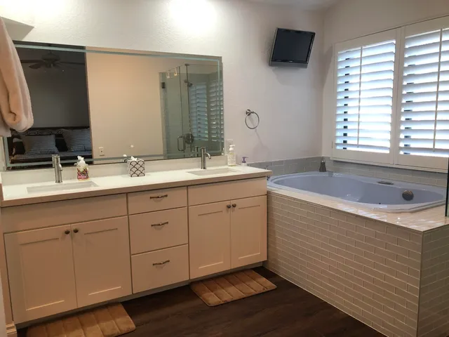 a white toilet sitting in a bathroom