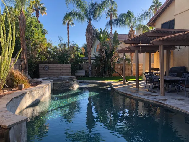 a front view of a house with patio