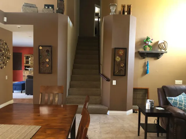 a bedroom with a bed and a dressers