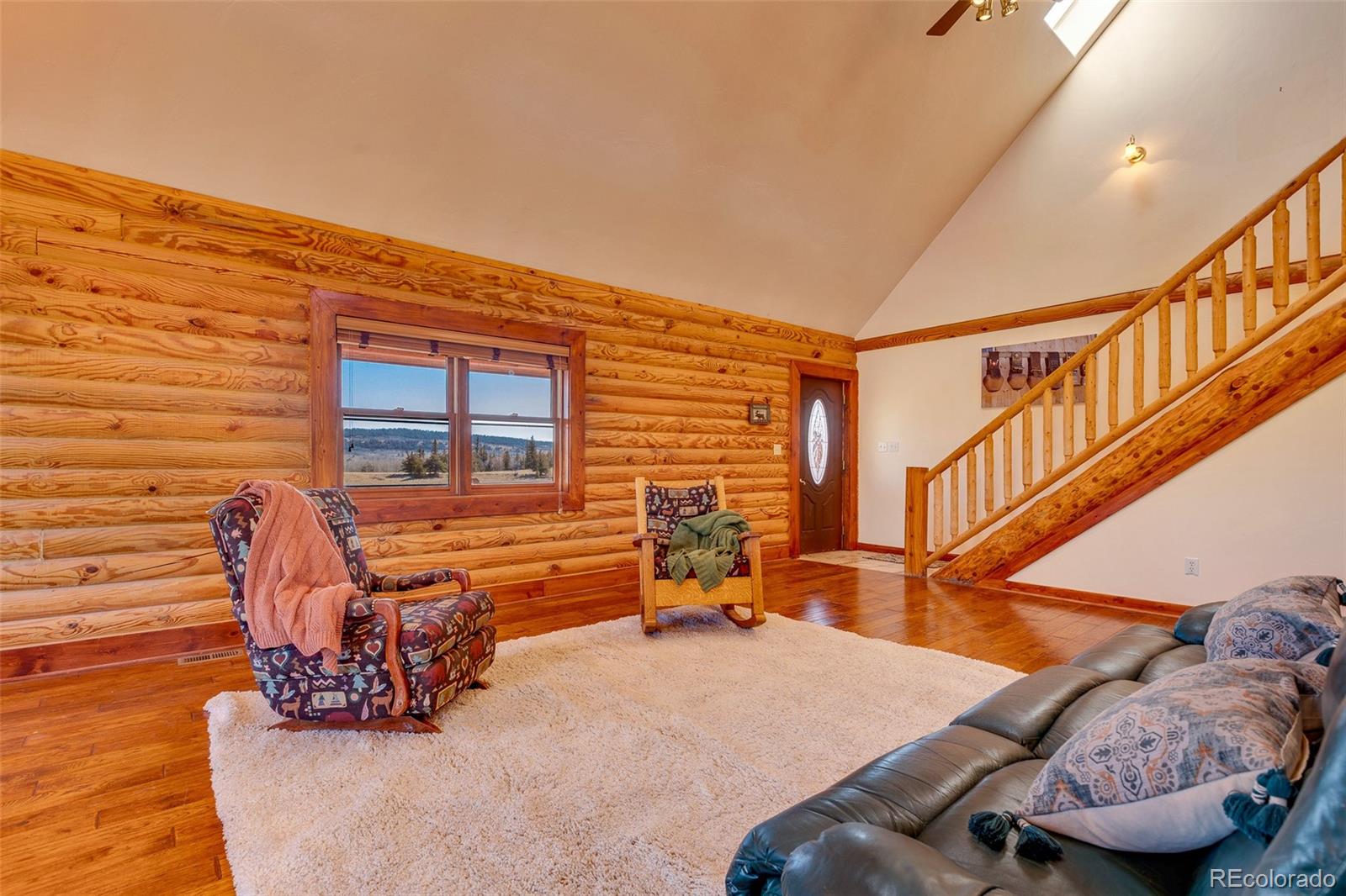 1528 Silver Heels Road Fairplay, CO 80440 - Photo 5 of 50 a view of a livingroom with furniture and staircase
