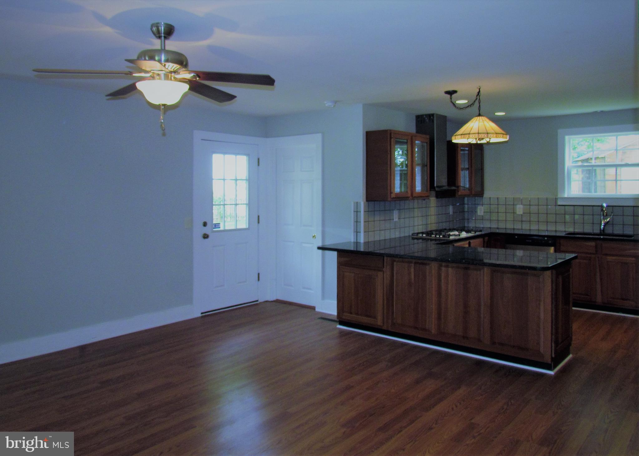 12336 Coppermine Road Union Bridge, MD 21791 - Photo 3 of 37 Living room / breakfast area open to kitchen