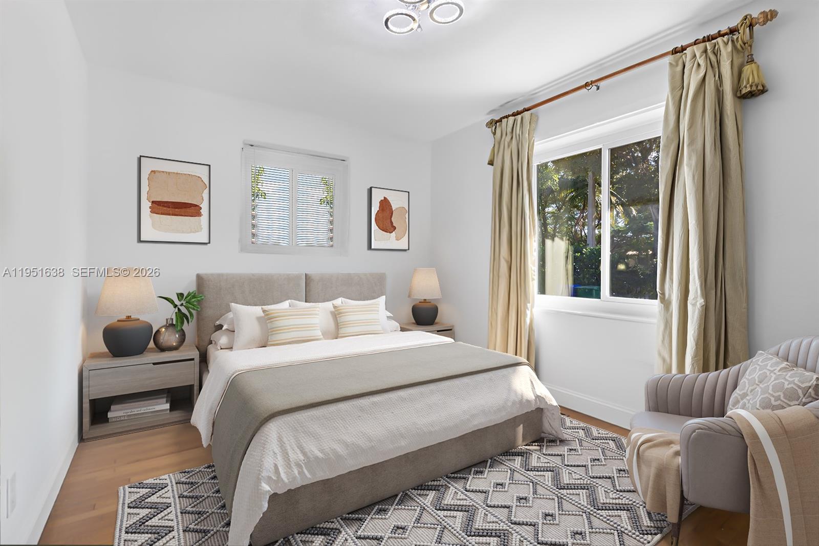 4331 Southwest 7th Street Miami, FL 33134 - Photo 13 of 46 a bedroom with a bed and glass window