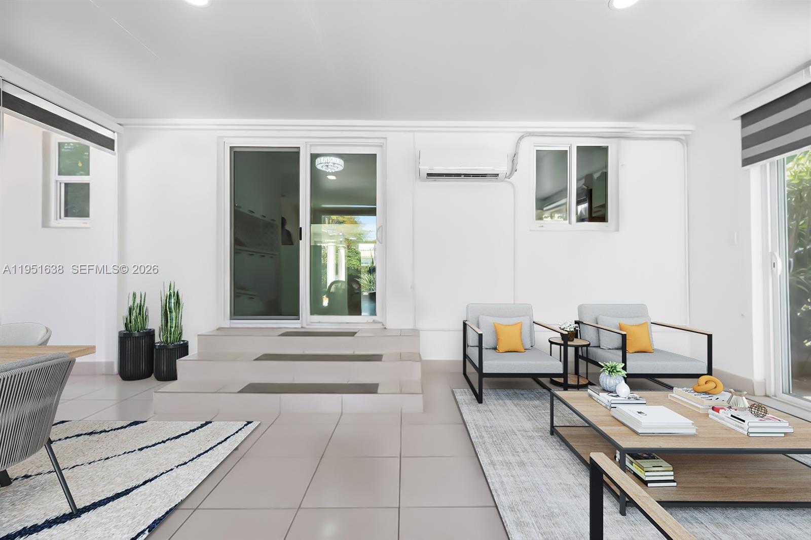 4331 Southwest 7th Street Miami, FL 33134 - Photo 17 of 46 a living room with furniture and next to a window