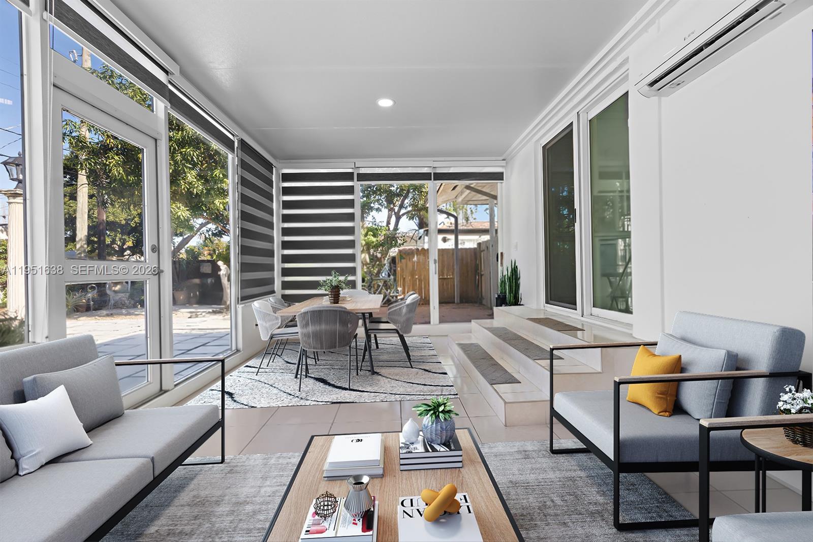 4331 Southwest 7th Street Miami, FL 33134 - Photo 18 of 46 a living room with furniture and a large window