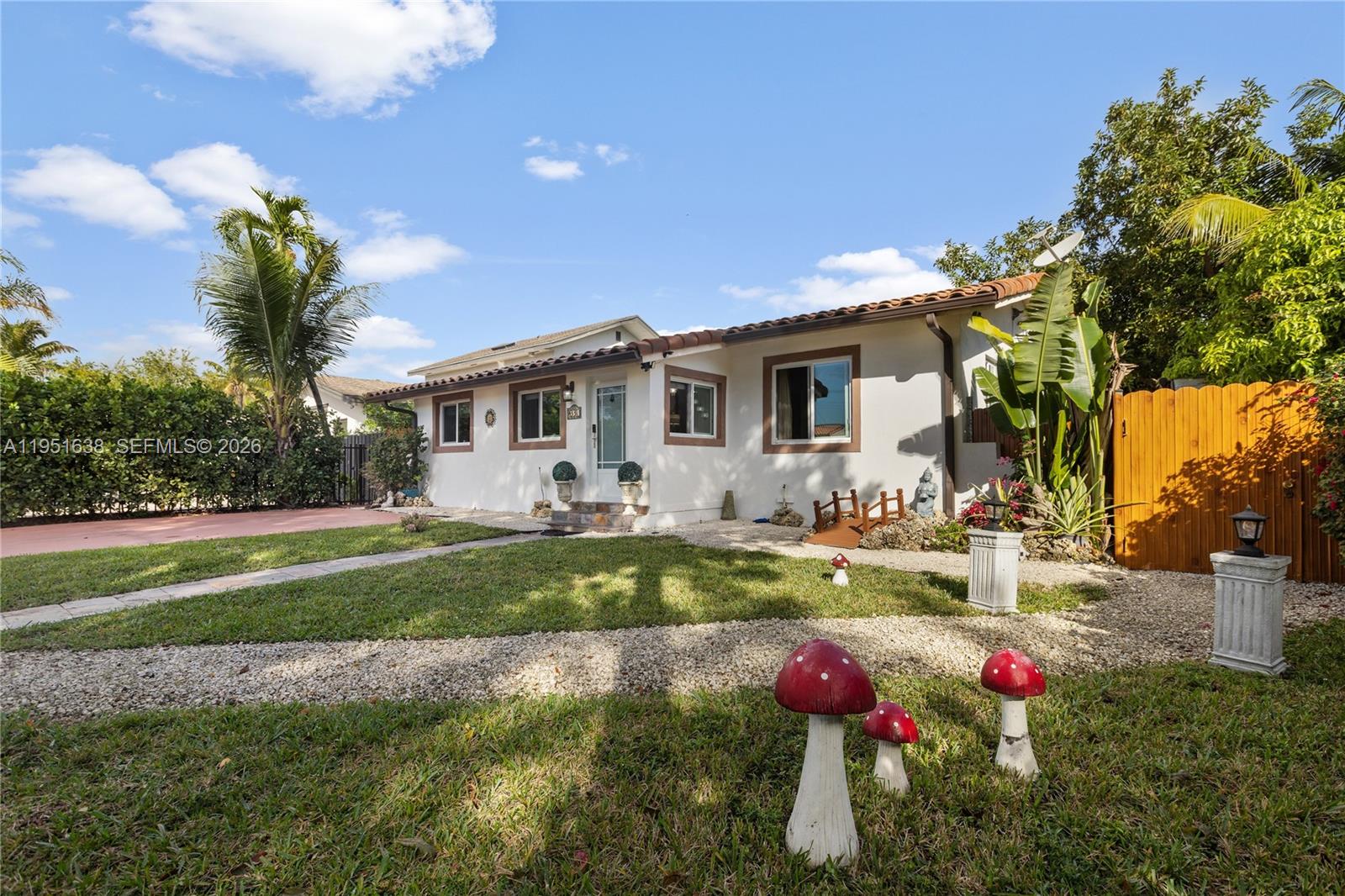 4331 Southwest 7th Street Miami, FL 33134 - Photo 2 of 46 a front view of a house with backyard