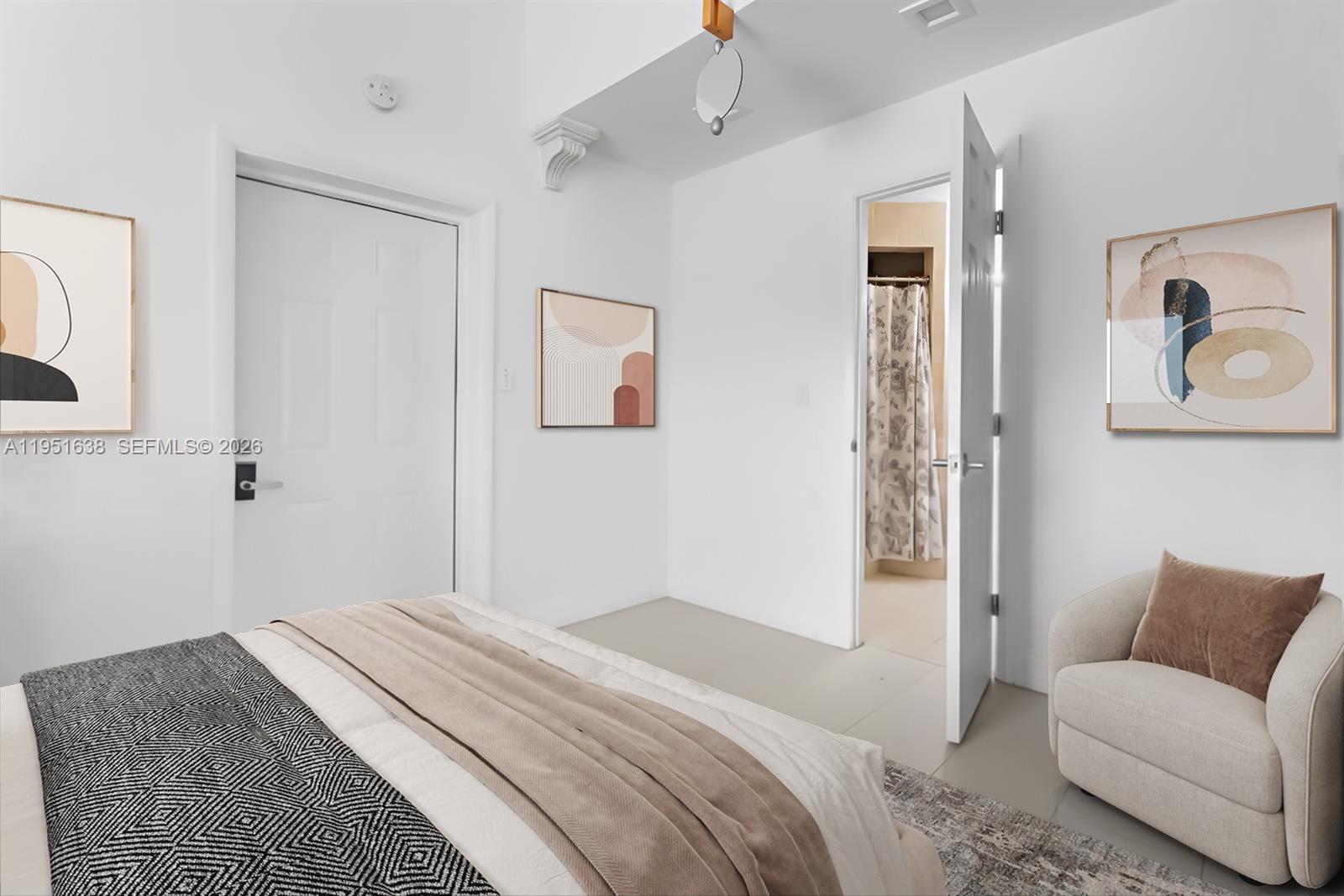 4331 Southwest 7th Street Miami, FL 33134 - Photo 26 of 46 a bedroom with a bed and a couch