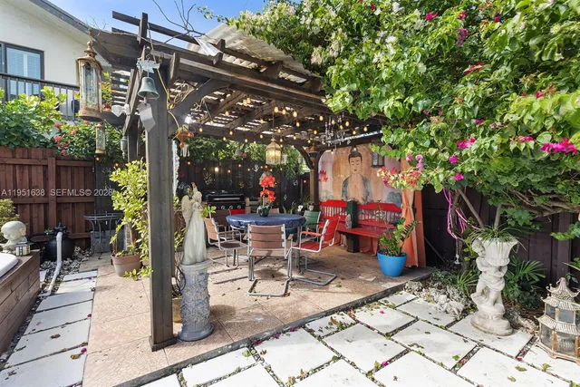 a outdoor space with lots of furniture and shower