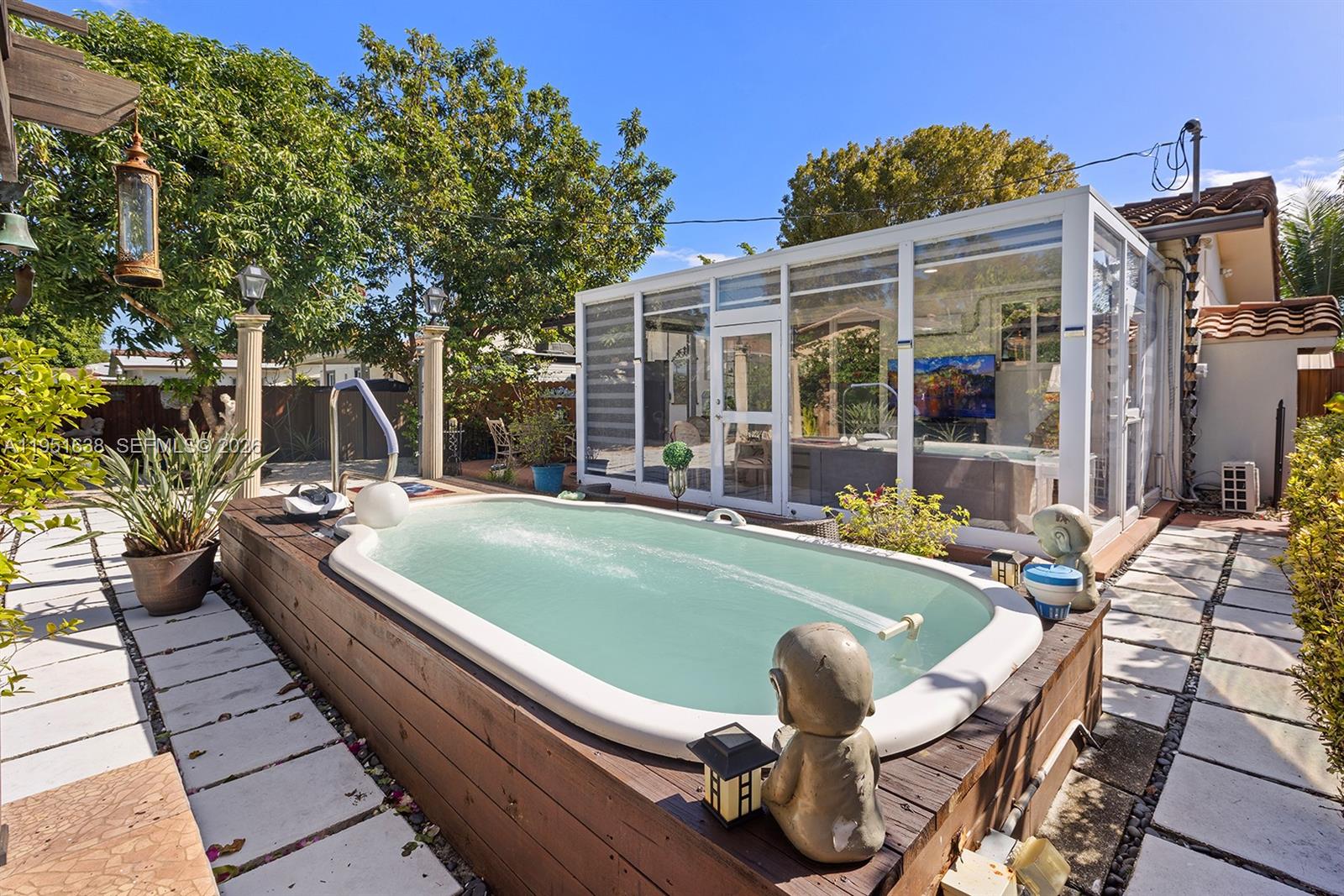 4331 Southwest 7th Street Miami, FL 33134 - Photo 35 of 46 a view of a swimming pool with chairs