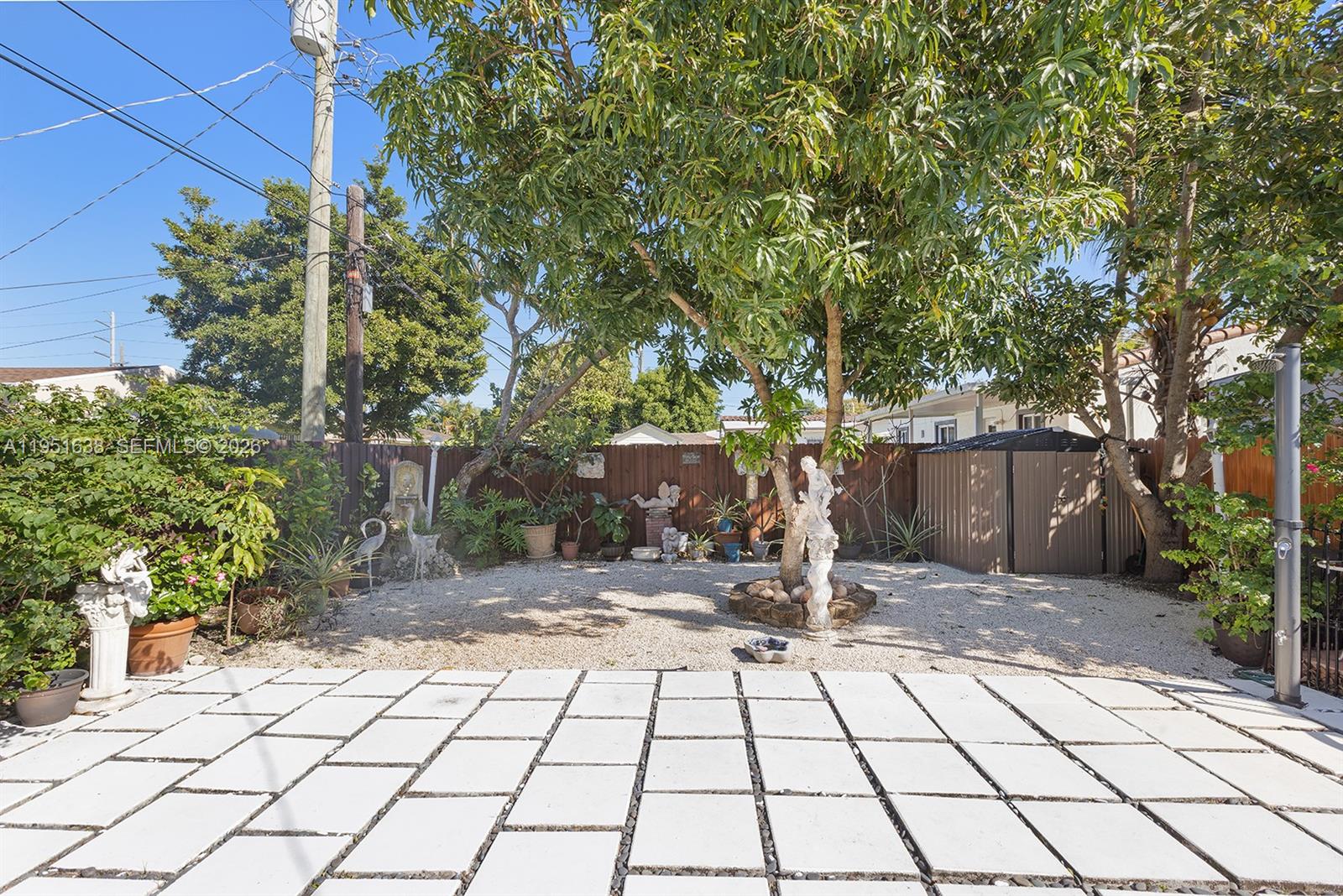 4331 Southwest 7th Street Miami, FL 33134 - Photo 40 of 46 a backyard of a house with lots of green space