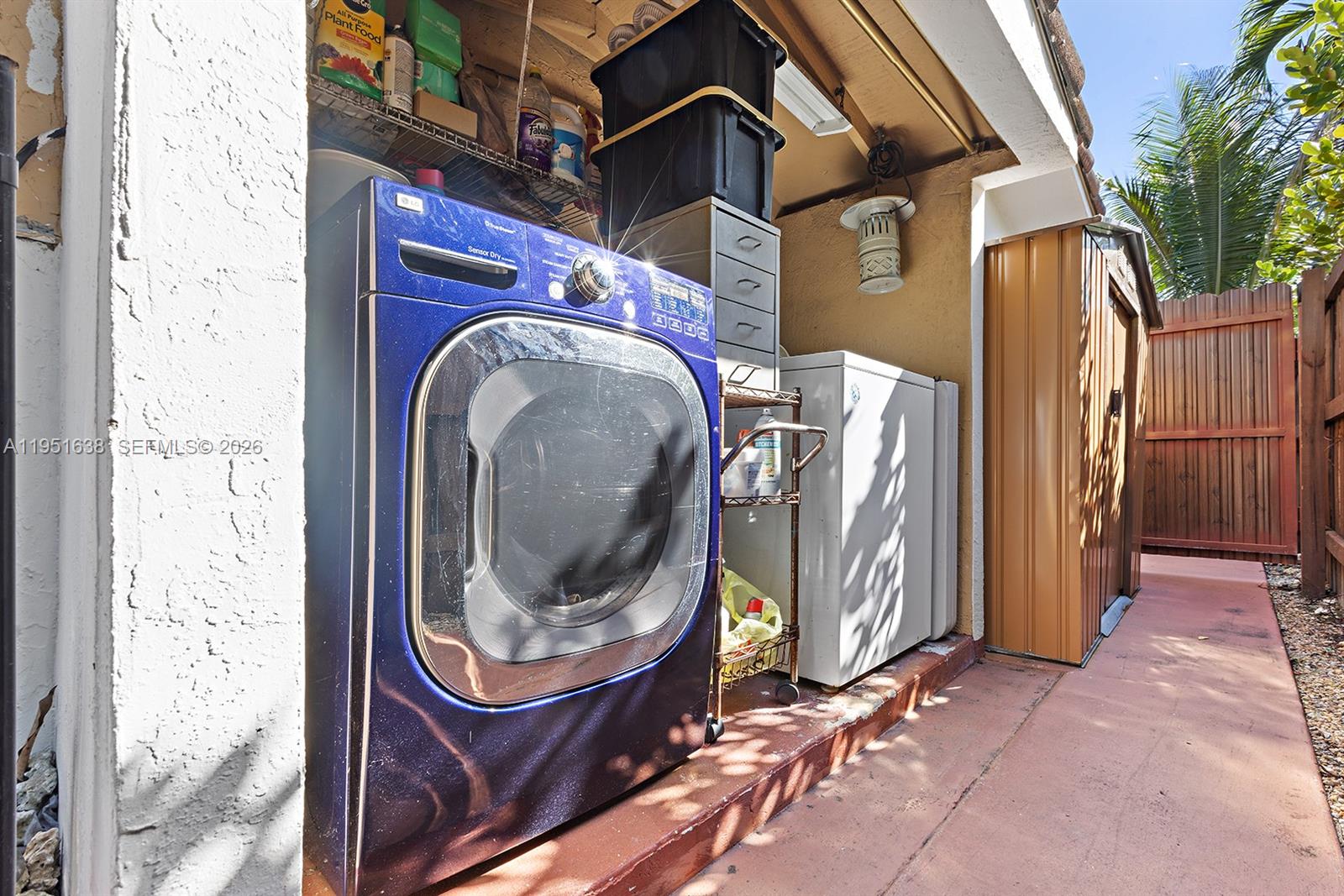 4331 Southwest 7th Street Miami, FL 33134 - Photo 43 of 46 a utility room with dryer and washer