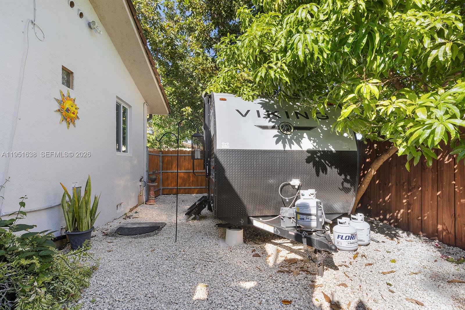 4331 Southwest 7th Street Miami, FL 33134 - Photo 45 of 46 a view of a chairs and table in backyard