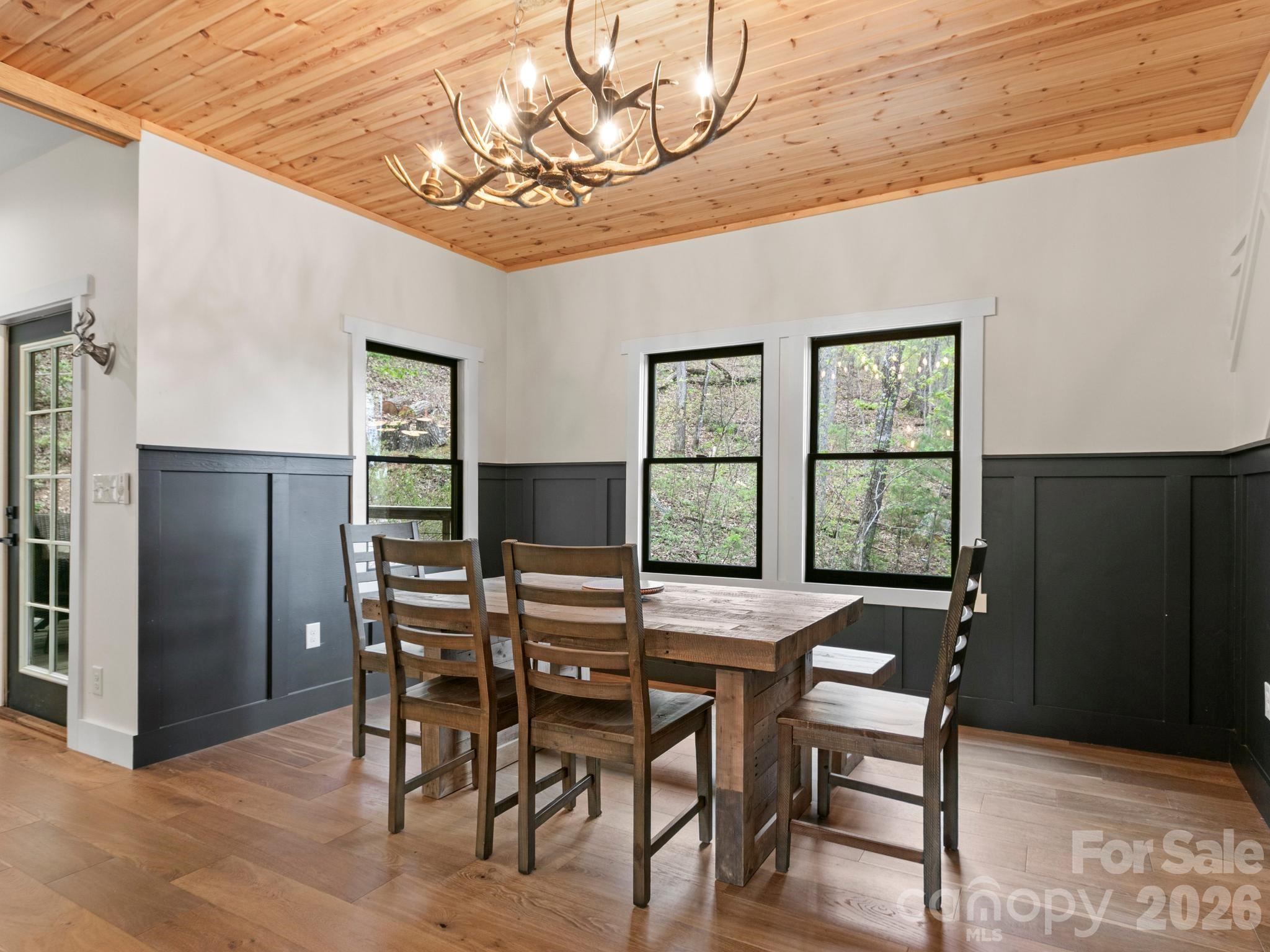 291 Webb Cove Road Asheville, NC 28804 - Photo 11 of 34 a dining room with furniture and window