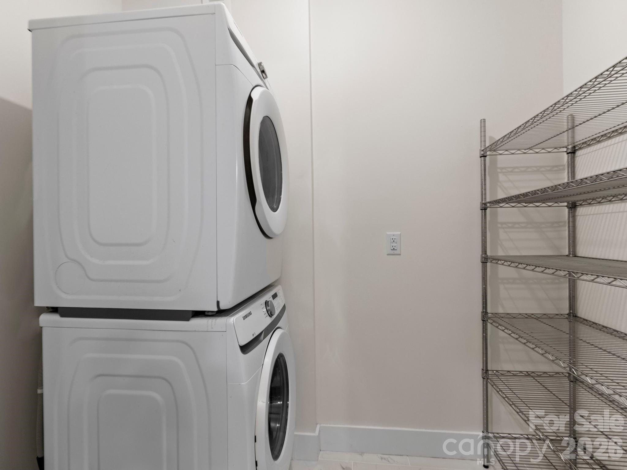 291 Webb Cove Road Asheville, NC 28804 - Photo 23 of 34 a utility room with dryer and washer