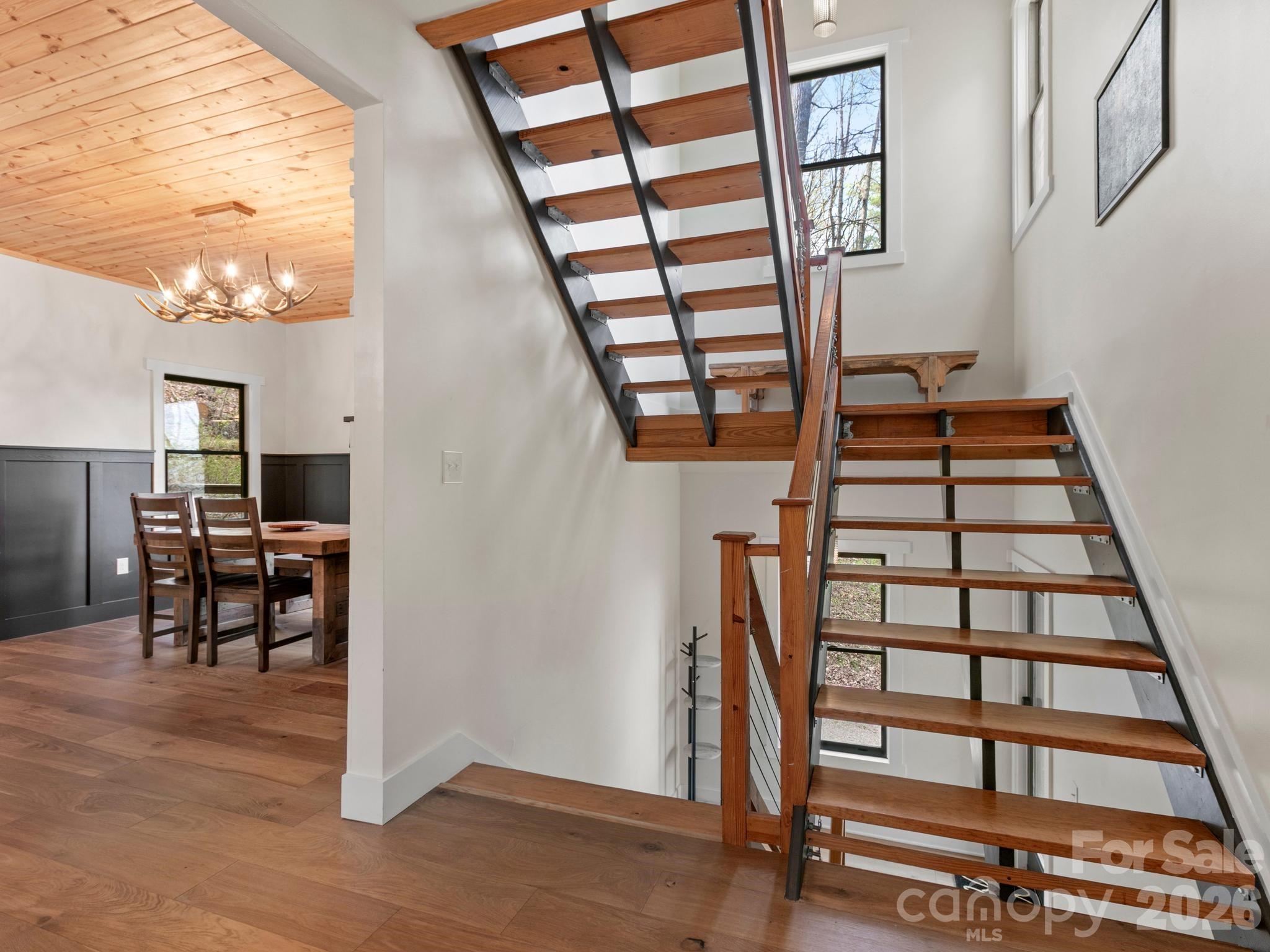 291 Webb Cove Road Asheville, NC 28804 - Photo 3 of 34 a view of entryway and hall with wooden floor