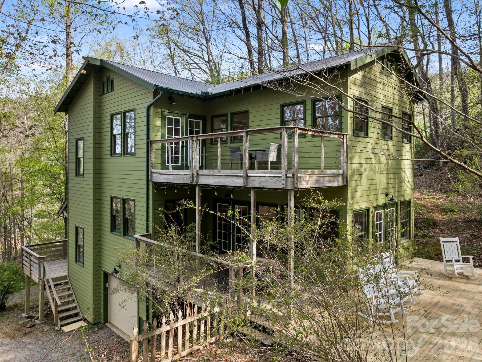 291 Webb Cove Road Asheville, NC 28804 - Photo 34 of 34 front view of a house with a small yard
