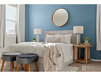 a aerial view of a house with a big yard and potted plants
