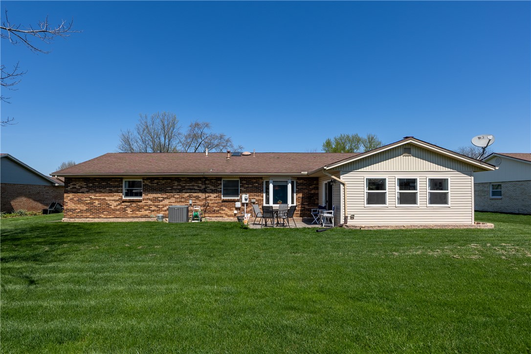 4210 Pleasanton Road Englewood, OH 45322 - Photo 28 of 34 This spacious backyard with a patio offers ample room for outdoor enjoyment.