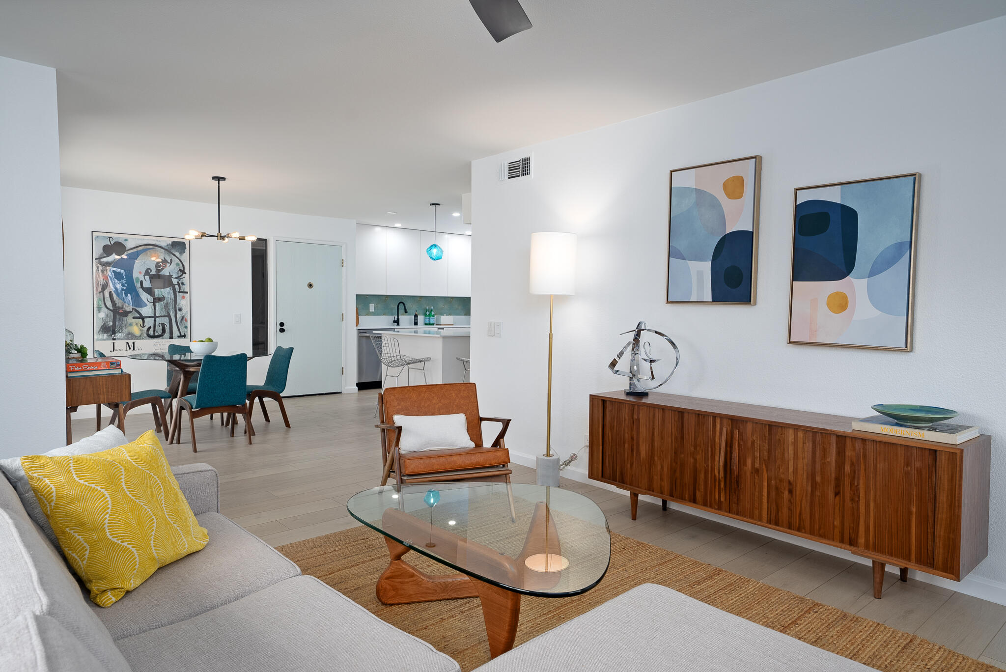 200 East Racquet Club Road, Unit 24 Palm Springs, CA 92262 - Photo 12 of 58 a living room with furniture and wooden floor