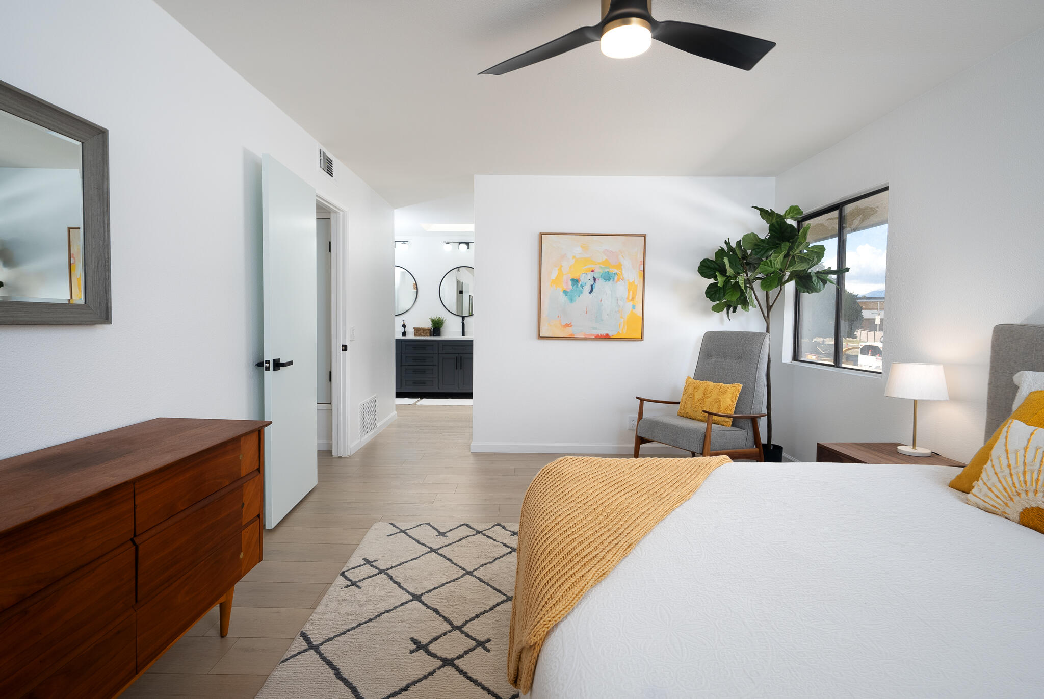 200 East Racquet Club Road, Unit 24 Palm Springs, CA 92262 - Photo 22 of 58 a bedroom with furniture and a chandelier