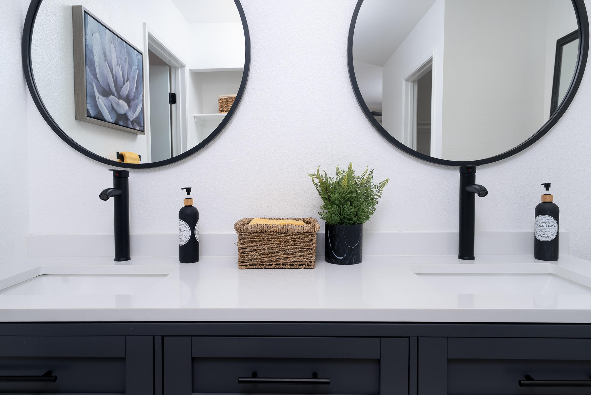 200 East Racquet Club Road, Unit 24 Palm Springs, CA 92262 - Photo 27 of 58 a bathroom with a sink and a mirror
