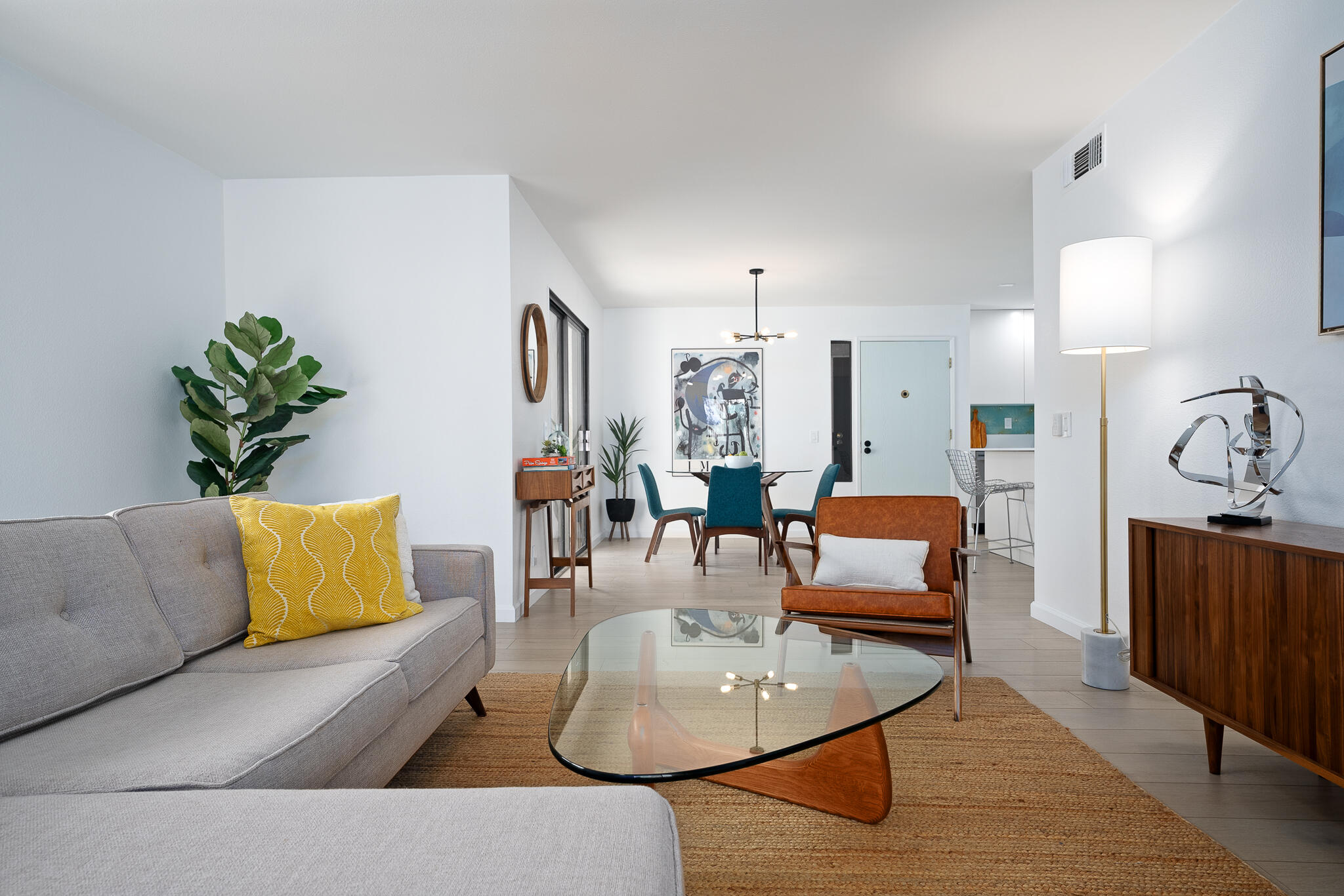 200 East Racquet Club Road, Unit 24 Palm Springs, CA 92262 - Photo 9 of 58 a living room with furniture and a couch