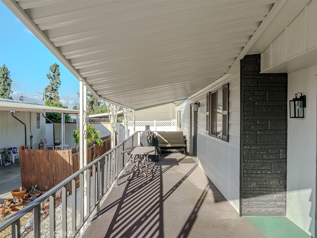 1327 Woodbrook Square Corona, CA 92882 - Photo 18 of 21 a view of a house with wooden floor