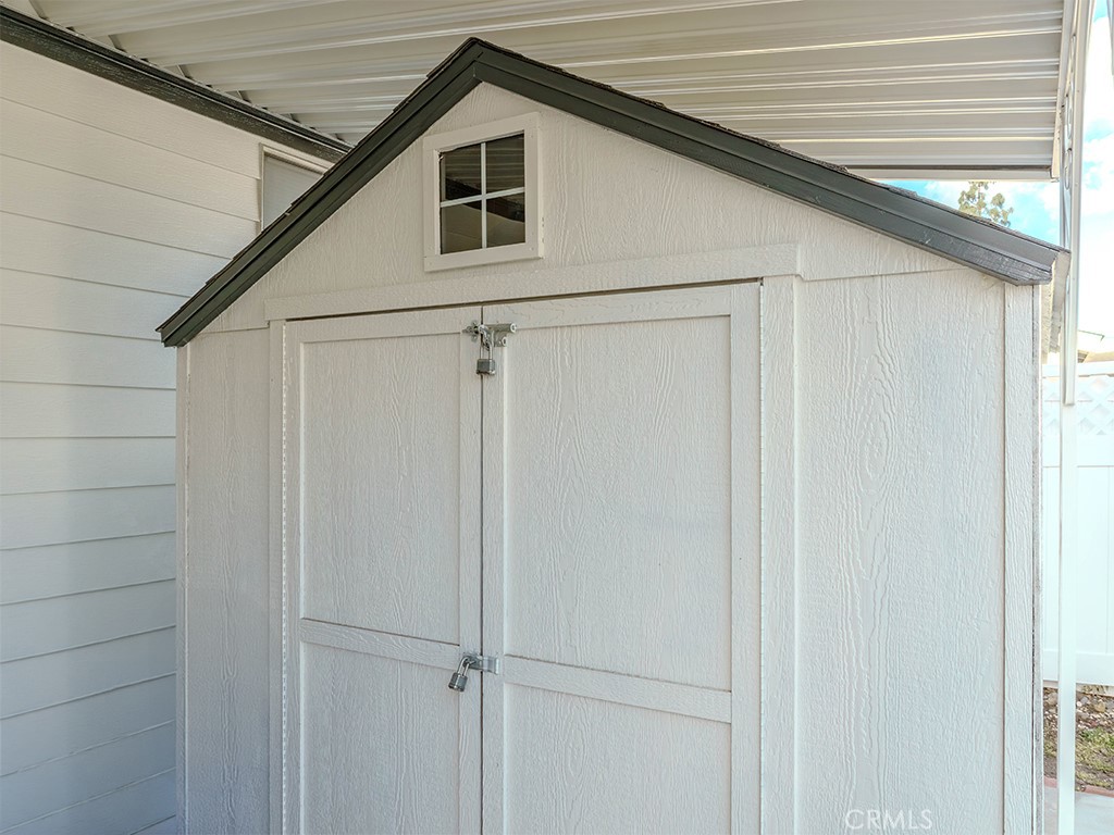 1327 Woodbrook Square Corona, CA 92882 - Photo 19 of 21 a white house with a shower and a bath tub