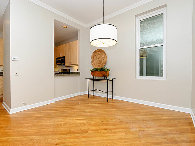 2730 North Racine Avenue, Unit 2S Chicago, IL 60614 - Photo 6 of 18 a living room with furniture and a wooden floor